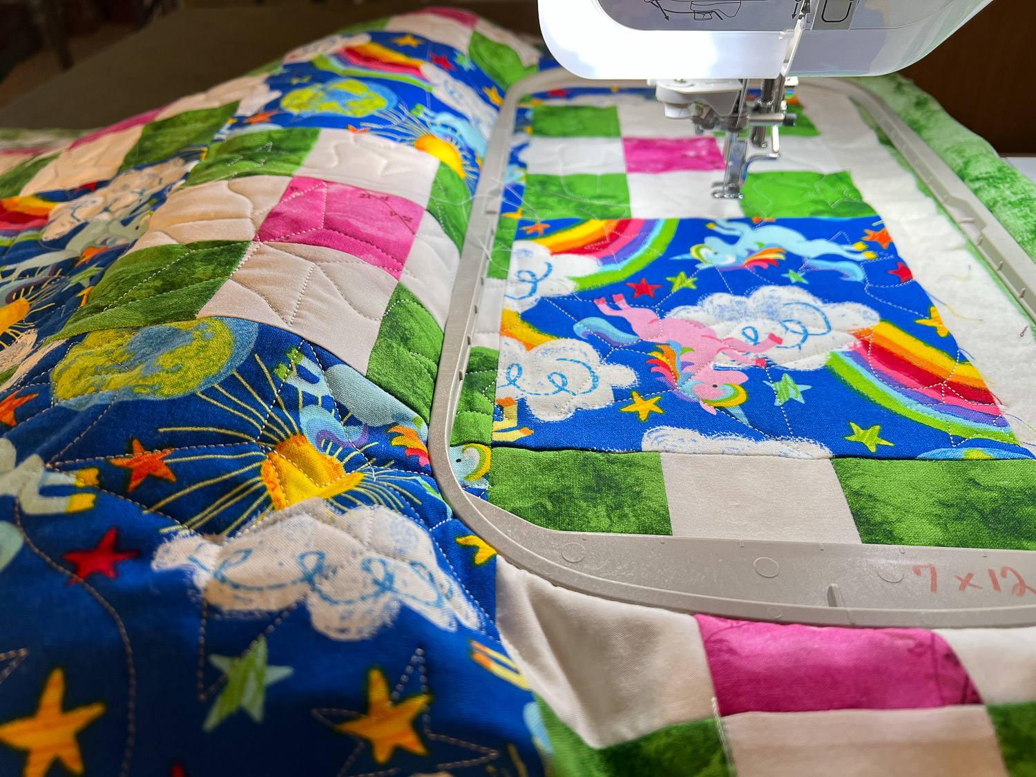 Edge to edge embroidery on quilt