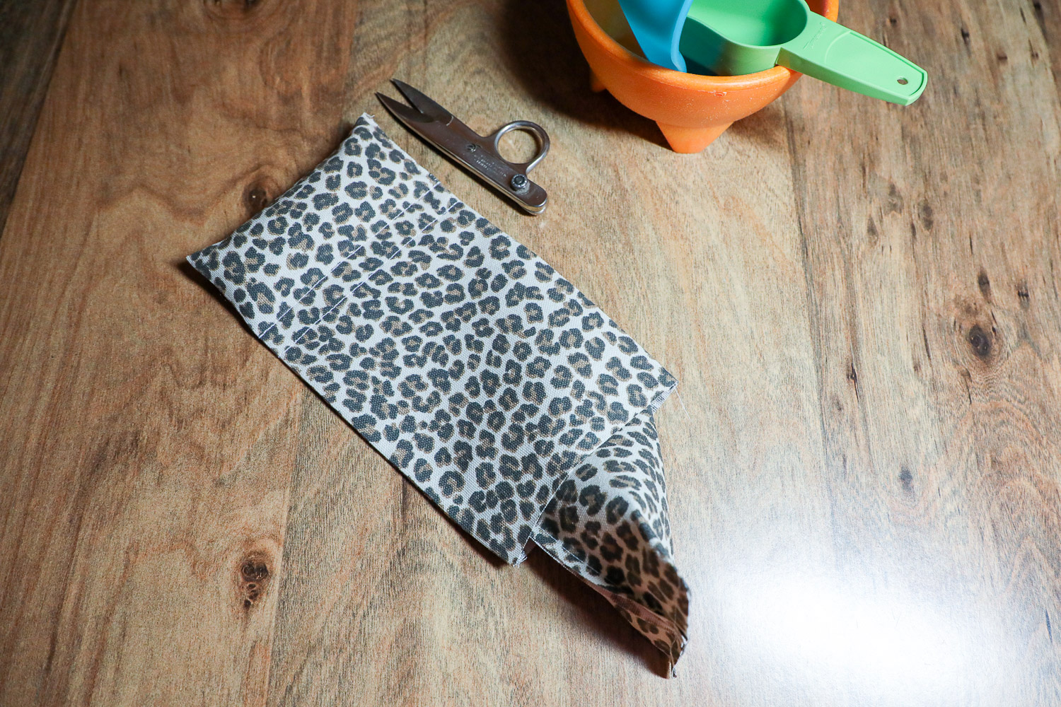 Insert poly pellet bag in phone holder