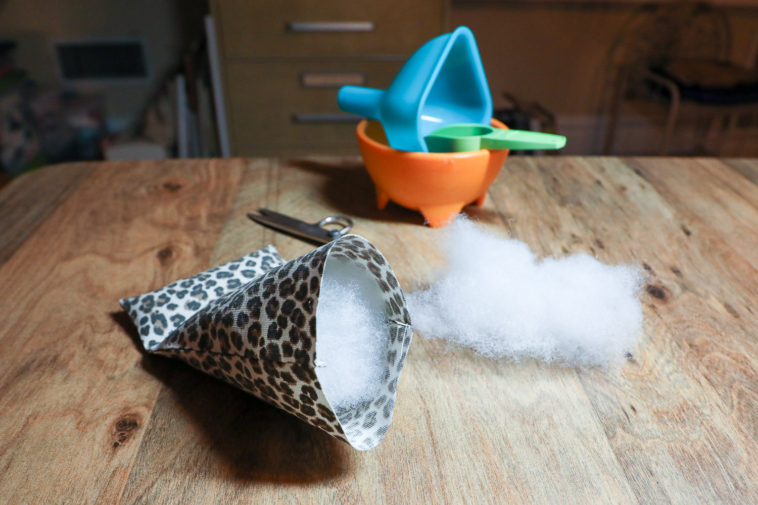 Add poly-fil in phone holder