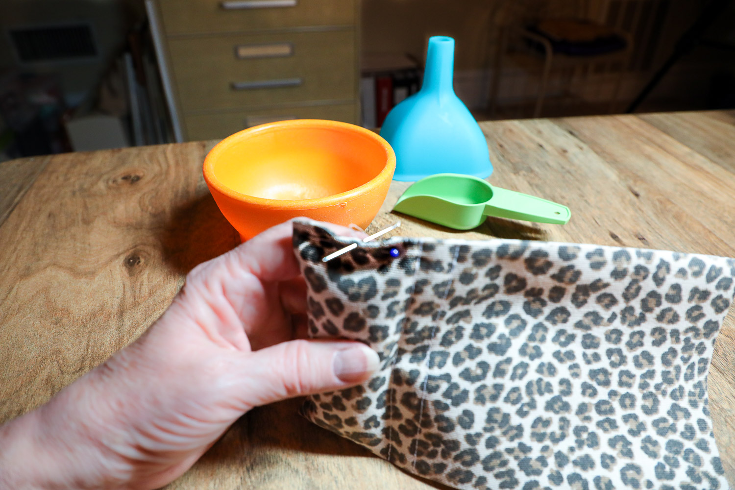 Whip stitch opening closed in phone holder